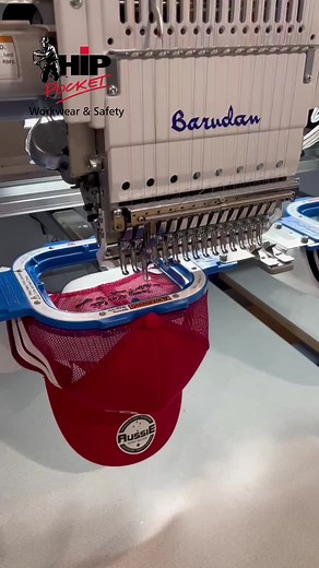 Embroidering trucker caps, customised with your artwork, day in and day out. This is our bread and butter, decoration, all you have to do is reach out and we will look after the rest of the process. Trust us with your branding. #hippocketworkwear #embroidery #brand #toowoomba | Hip Pocket Workwear & Safety