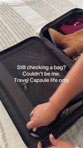 I pack 30 outfits in a carry-on and sleep just fine. #Shorts #the_travelista