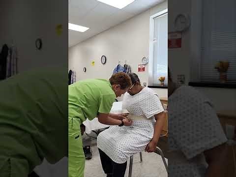 PROMETRIC 2022: ASSISTS WITH AMBULATION USING A TRANSFER (GAIT) BELT (Resident Sitting in a Chair)