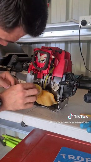 Trimmer Maintenance 🔧🌱 Replacing fuel filter on my Honda trimmer. if your machine is bogging down and stalling out it's either not; Breathing properly 🌬️ or getting fuel properly ⛽ An old video of mine saw me cleaning the air intake so it's not that; but no we have rectified the issue and she's running great 👌 #trending #fyp #mowtok