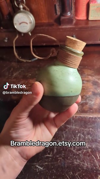 A little bit bigger magic potion bottle, made of stoneware and faux leather, great for cosplay costumes or LARP #handmadeceramics #pottersoftiktok #potterytok #ceramicartist