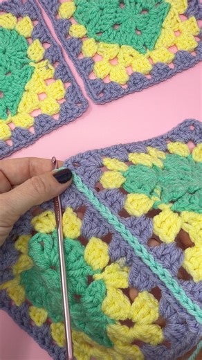 This simple joining technique works great with our new Sweet Hearts granny squares. Shop the yarn: https://bit.ly/499D3nX | Red Heart Yarns