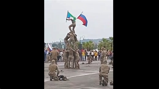 Russian Soldier Cheerleader Pyramid in Guinea