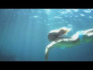 Swimming girl is in for a surprise