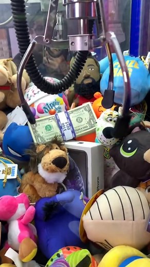 658K views · 2.7K reactions | $100 Inside Claw Machine  #reels #clawmachine #clawmachinehack #clawmachinewin #Arcade #viral #lifehack #iphone #ipad #airpods #money #cash #cranegame #clawgrabber | TYE Arcade | Facebook