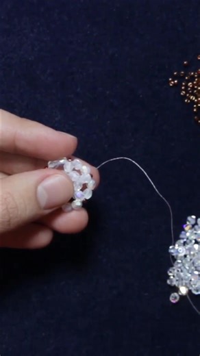 2.1K views · 25 reactions | Learn how to create a dazzling snowflake centerpiece! This video guides you through adding bicones and beads for an elegant, festive look. Perfect for the holidays or any special occasion. #EdwinBatres #ArtYoullLoveToWear #SnowflakeDIY #CenterpieceIdeas #BeadedCrafts | ACL Patterns and More | Facebook