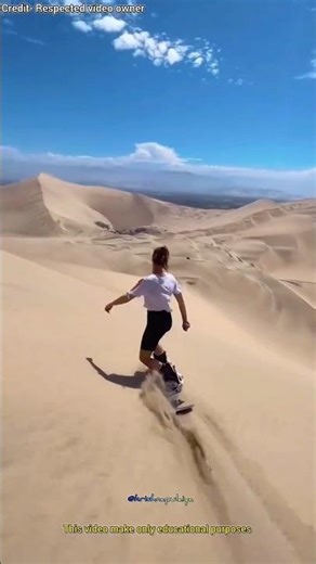 How do people surf on the sand?