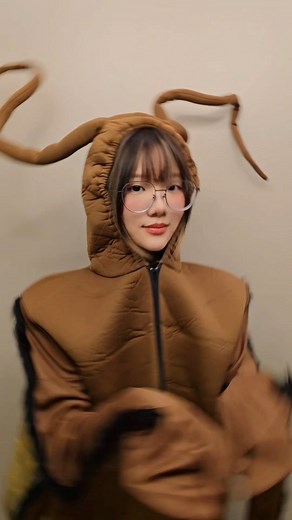 spicyuuu on Instagram: "A friend came over to borrow my cockroach costume for her company’s EOY dinner, and this video was born."