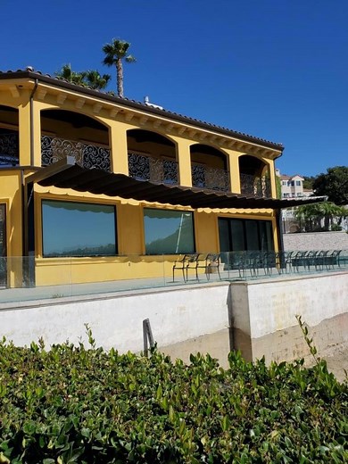 Infinity Canopy | Slide on Wire Retractable Awning | The Awning Company