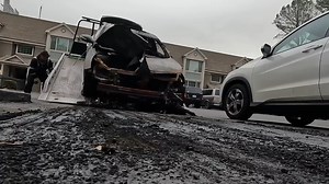 Two burned cars... and one nearly took the building with it