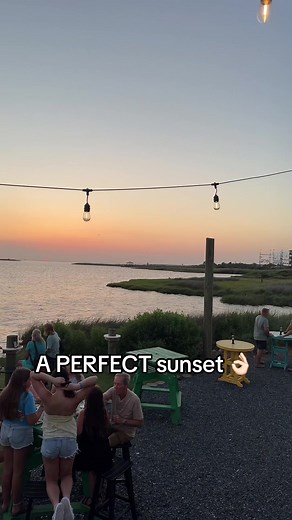 🌅 Outer Banks sunset magic at Miller’s Waterfront Restaurant 💛 Dinner with a view in Nags Head is a must! #OuterBanks #OBXSunset #MillersWaterfront #NagsHeadNC #OBXRestaurants #WaterfrontDining #ParadiseOnEarth #FamilyVacationVibes #SunsetViews #OBX2025