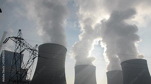 Heavy industrial air pollution from smokestacks. Factory chimney blowing pollution in environment. Toxic smoke from thermal power plant in industrial area. Industrial landscape with contaminated air.
