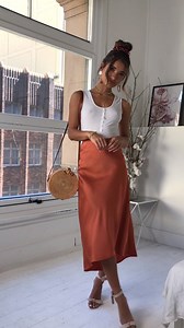 4.9K views · 19 reactions | Our 'Future Forever Midi Skirt In Rust Satin' and 'Keep Your Cool Bag In Tan'! Shop now at https://www.showpo.com/future-forever-skirt-in-rust-satin and https://www.showpo.com/keep-your-cool-bag-in-tan ! Xx | Showpo | Facebook
