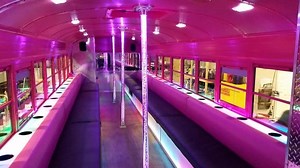 The Bubble Gum Party Bus! For more Party Buses and Rates visit www.RentMyPartyBus.com or call 612-226-1188 FEATURES: 3 Light Up Bubble Dance Poles !!! All black exterior Pink and black interior Pink and black limo seating Light up panels from front to back Stainless steel & mirrored wet bar & cooler Keg holder Cd player Aux for i-pod & mp3 Amazing sound system 6×9 speakers Subwoofers Fully mirrored rest room Very nice floors Seat 20-35 Check out the full description and pictures on our website h