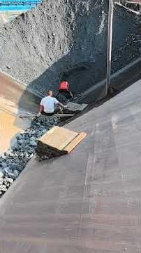 Unloading Massive Rocks from a Sand Ship