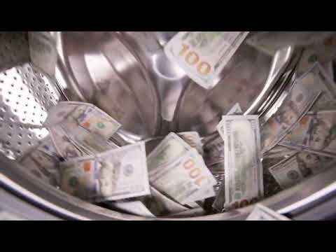 United States Dollar banknotes inside washing machine