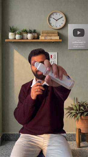 Kuldeep Singh Bhadoriya on Instagram: "Use this prompt ⬇️ “Edit the uploaded image while keeping the exact camera angle, framing, seat position, plant position, and switchboard unchanged. Preserve the natural sunlight shadow exactly as in the original image, including its angle, direction, shape, and softness. Change the wall color to a calm earthy tone (sage green, warm beige, or soft grey). Add a floating wooden shelf with a few books and small plants, plus one subtle, minimal wall decor eleme