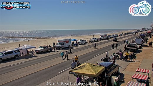 LIVE view along the Galveston beachfront. Crowds and festive activity happening right now. www.saltwater-recon.com | Saltwater-Recon.com