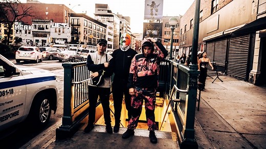 “It’s about deconstructing the systems that have created all this poverty, sectarianism, hatred and murder”: Belfast rap trio Kneecap announce debut album Fine Art, share mosh pit video for Sick In The Head