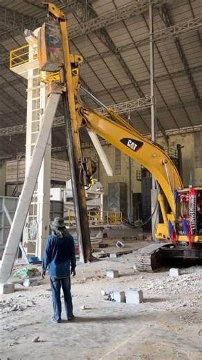 precast pile driving by excavator #