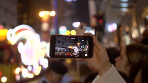 Free stock video - Filming parade on smartphone
