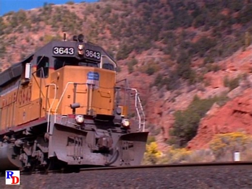 Railfan Depot | An eastbound mixed freight climbs the west side of the Soldier Summit grade at Red Rock Canyon. From the Pentrex show "Soldier Summit... | Instagram