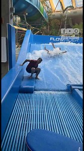 FlowRider surf goes wrong: Dad falls and takes a staff member down with him