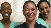 Portrait of Three Happy, Diverse Female Medical Professionals Smiling...