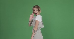 Excited Woman Waving Hand Gesturing Hello Stock Footage Video (100% Royalty-free) 1041412297 | Shutterstock