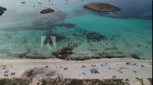 Nudist beach. Breathtaking aerial view flight drop down drone beach formentera island ibiza spain, fall 2022. High Quality 4k Cinematic footage