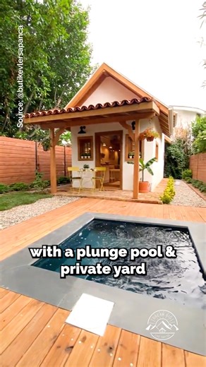 Would you live in this tiny house with your own plunge pool & private yard? This is currently setup as an Airbnb rental & would definitely need some changes for full-time living! Inside, the tiny home features a galley kitchen with small retro appliances, a living room, a full bathroom with a tile shower, & a loft bedroom! The highlight is definitely the outdoor living area, featuring a covered porch to have your morning coffee & a tiny plunge pool! This tiny house is built by Butik Evler Sapanc