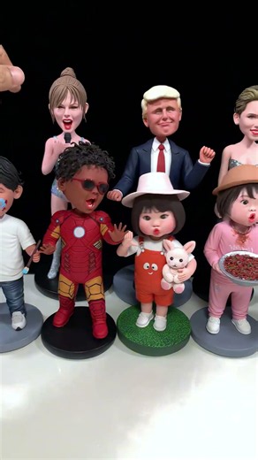 Merry Handmade Clay Bobbleheads Shaking in Harmony
