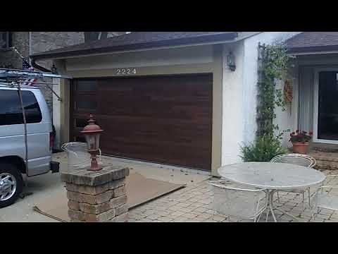 chi 2347 accents walnut planks garage door with etched insulated glass