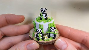 57K views · 1K reactions | Miniature Pandas cake on the wooden stand....