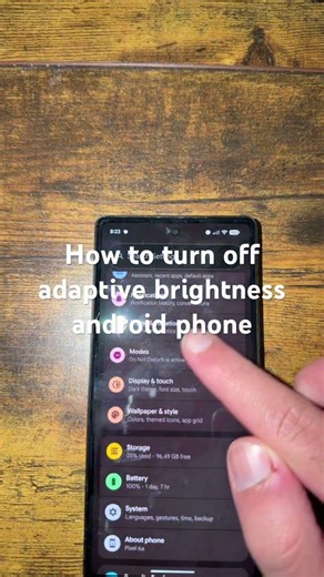 How to turn off adaptive brightness android phone