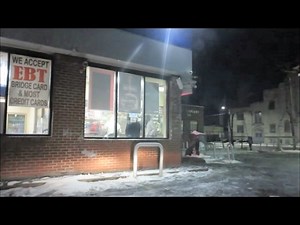 INSIDE A GHETTO GAS STATION AT NIGHT ON DETROIT'S EAST SIDE