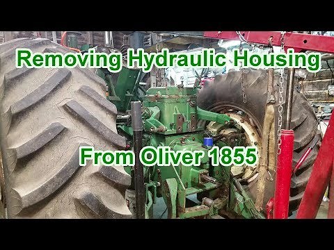 Removing cracked leaking hydraulic housing from Oliver 1855