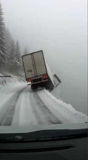 Semi Truck Slides Off Icy Mountain Road and Vanishes into Fog 🚛