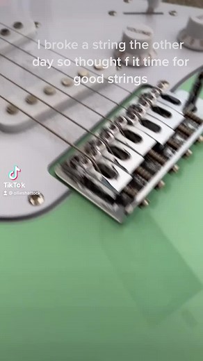 Changing Guitar Strings on a Budget Squier: Easy Tips