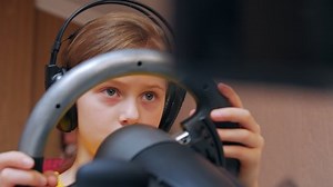 Girl Playing Computer Races Headphones On Stock Footage Video (100% Royalty-free) 1085001571 | Shutterstock
