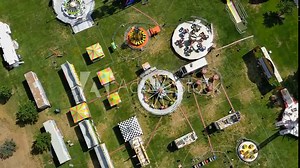 Local carnival/fair with Ferris Wheel and various other entertainment rides and attractions.