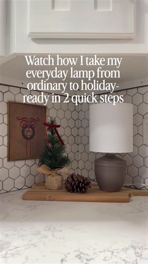 Claudia | DIY for Beginners | Budget Home Makeovers on Instagram: "Turning my everyday lamp into a cozy Christmas moment took literally two steps: 1. Swapped the shade for a rich red one 2. Added a bow… because bows make everything festive. Done! Simple, cute, and makes the whole corner feel holiday ready 😃 FOLLOW for more easy Christmas decor ideas you can recreate at home 🎄✨ #christmasdecorideas #holidayhomedecor #easychristmasdiy #festivehome #diyhomedecor"