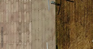 View from the copter, military helicopters stand in a row on the site. Military aviation, army air transport. Preparation for takeoff, military exercises. 4k, ProRes
