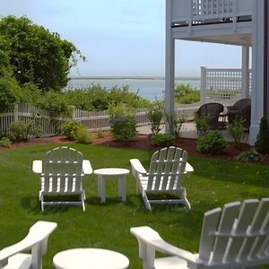 A bird’s-eye view from a summer day. Did you know our 217 rooms are spread across 25 waterfront acres including our Main Inn building and dozens of classic Cape Cod cottages? | Chatham Bars Inn
