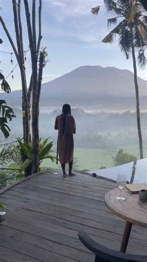 Early Morning Serenity with a Misty View of Mount Agung in Bali