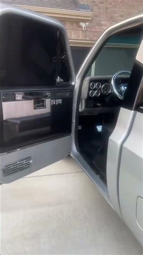 A clean C10 on 26 inch custom wheels.