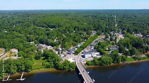 Groveland town aerial view including Bates Bridge on Merrimack River and Elm Park in town center of Groveland, Massachusetts MA, USA.