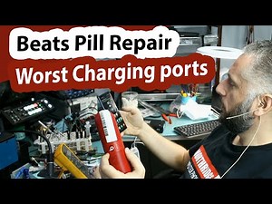 Beats pill Broken Charging connector repair with ripped traces.