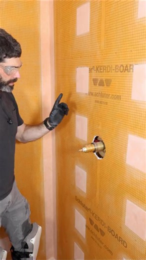 Schluter mixing valve waterproofing tip…I using mixing valve seals on every project. This protects the exposed edge of my KERDI-BOARD from water and water vapor. It also redirects any water or moisture that gets behind the tile or shower valve trim. Many thanks to Schluter for sponsoring this tutorial 🔥#showerremodel #schlutersystems #bathroomremodel #homerepairtutor #brandpartner | Home Repair Tutor