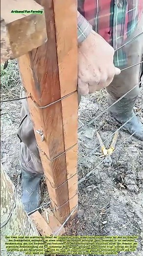 Fence construction: Stretching wire mesh onto wooden posts